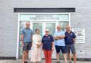 Priti Patel with staff at Earls Colne Heritage Museum