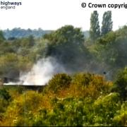Lorry on fire inside service station causing delays for drivers