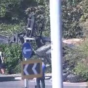Overturned - the tractor on Widford roundabout