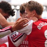 Martin Odegaard (right) celebrates scoring the winning goal with Kai Havertz (John Walton/PA)
