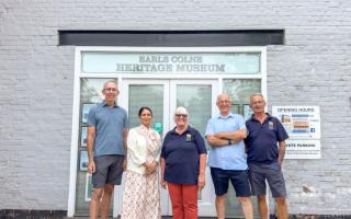 Priti Patel with staff at Earls Colne Heritage Museum